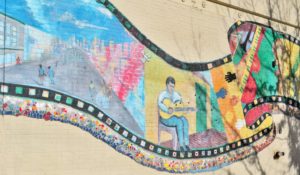 A Welton Street mural depicts the diversity of the Five Points Neighborhood. 