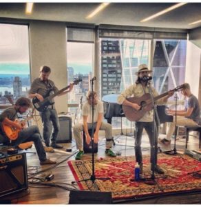 Moon Taxi recording "Acoustic on West 56th" in NYC highrise