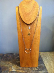 "XO" necklace - by INK $64 (local designer) "Locked Heart" (gold) necklace - by Avindy $202 "Heart Strum" necklace - by INK $156 (local designer)