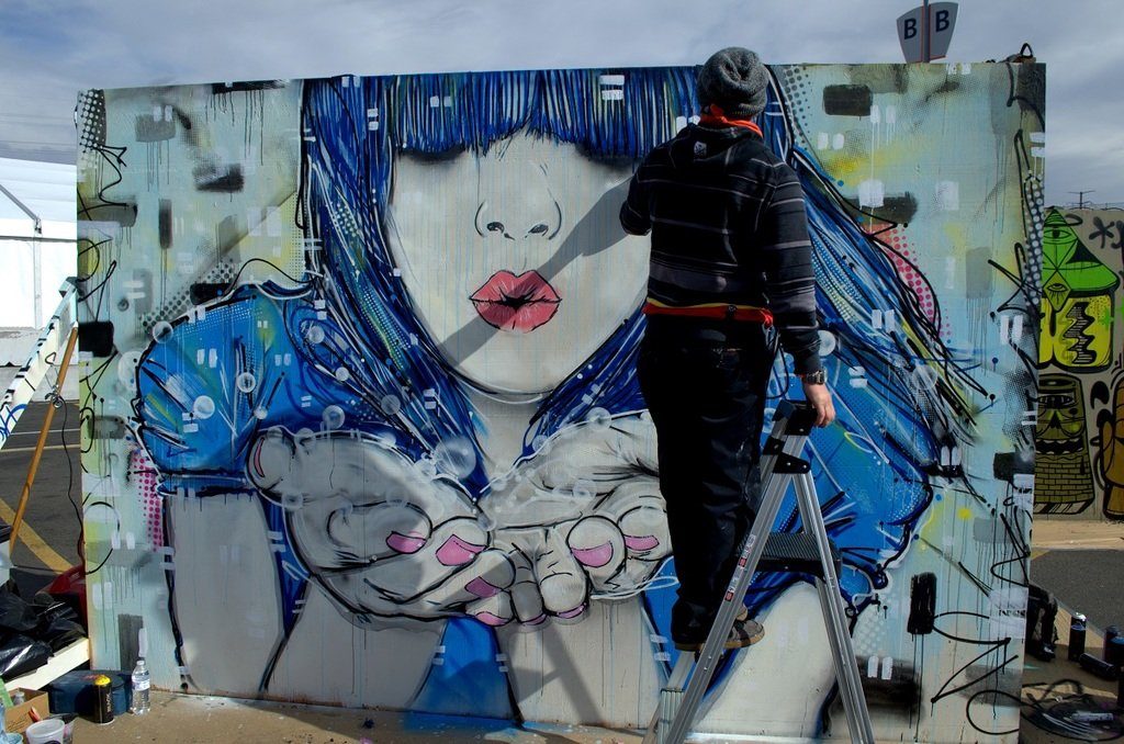 Michael Ortiz paints at Snowball 2014, photo by Lindsey Bartlett