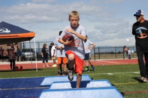 youth football, football camp, changing lives one play at a time, denver youth football