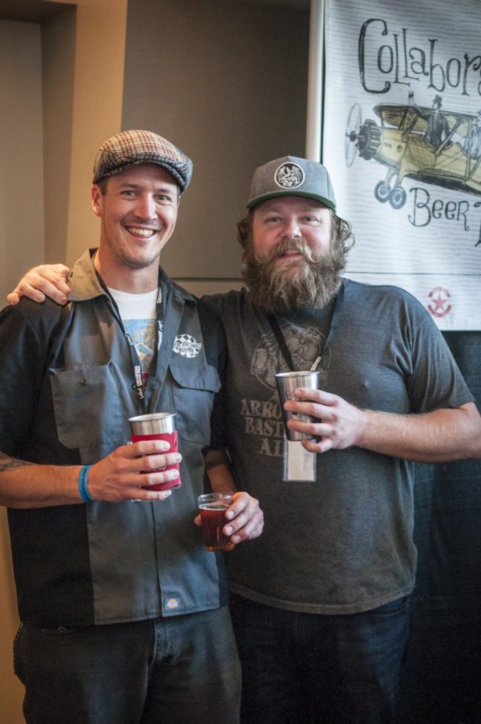 Brewers from Ska and Stone sharing a beer