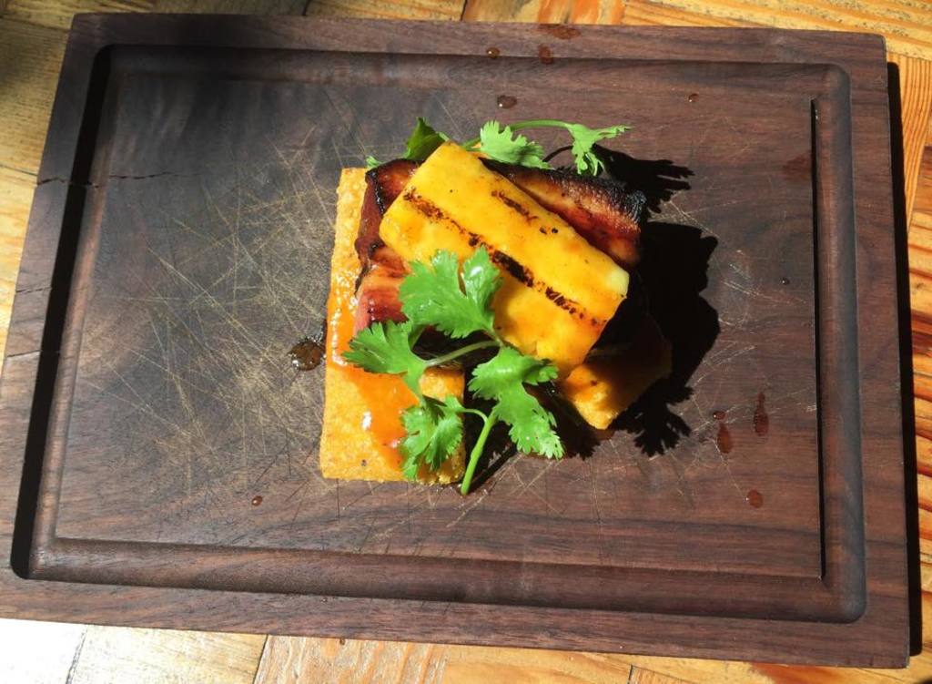 Leña's new pork belly dish served with grilled pineapple. Photo by Jimmy Callahan 