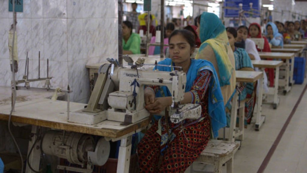 A women working in a garment factory in Bangladesh (Photo courtesy of fashionista.com).