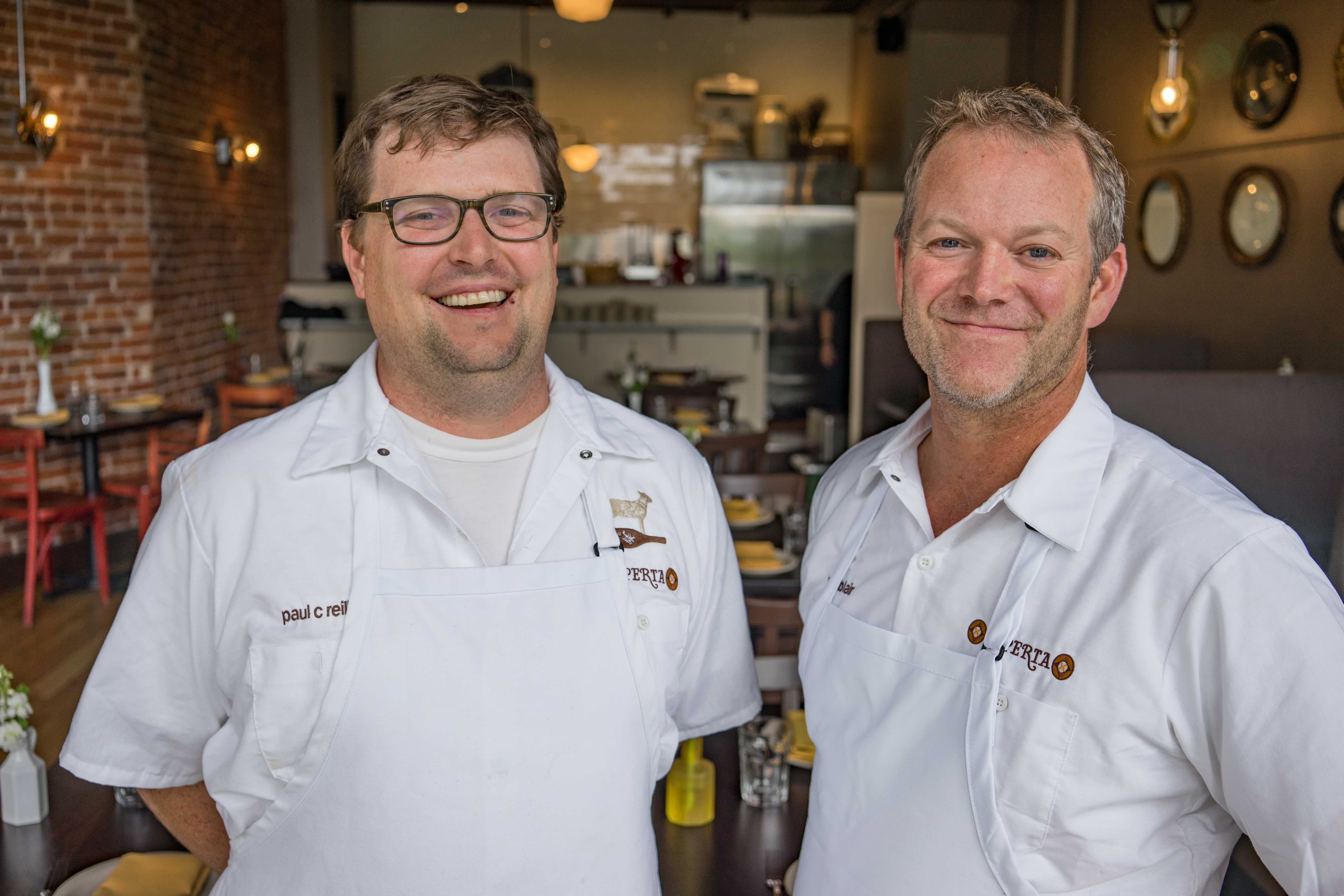 Chef Paul C. Reilly (right) and Bob Blair at beast + bottle's new sister restaurant Coperta.