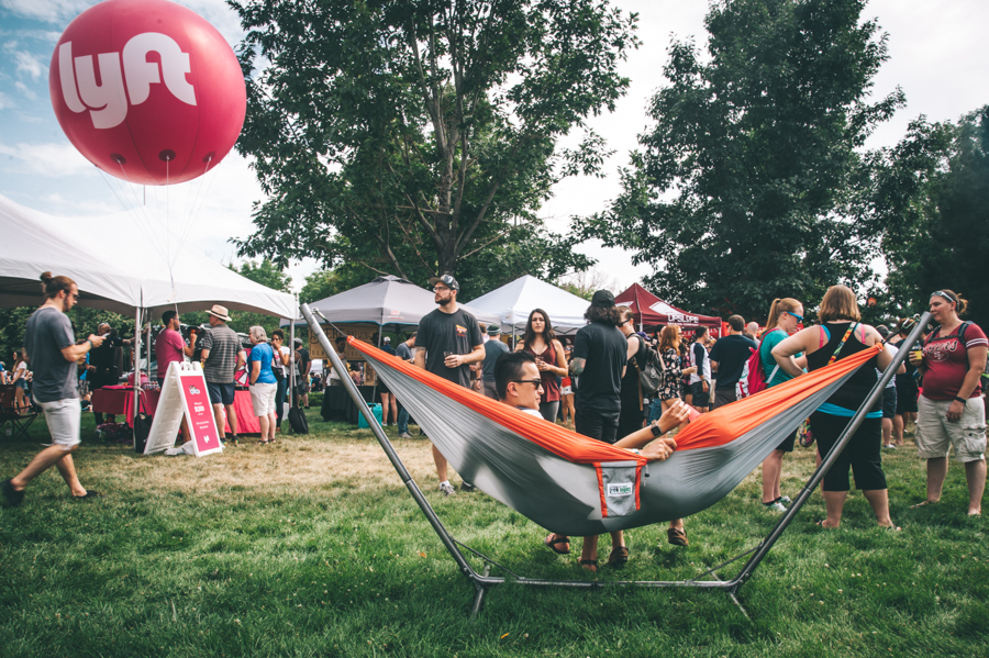 Festival-goers relaxing in one of the many hammocks throughout the grounds.