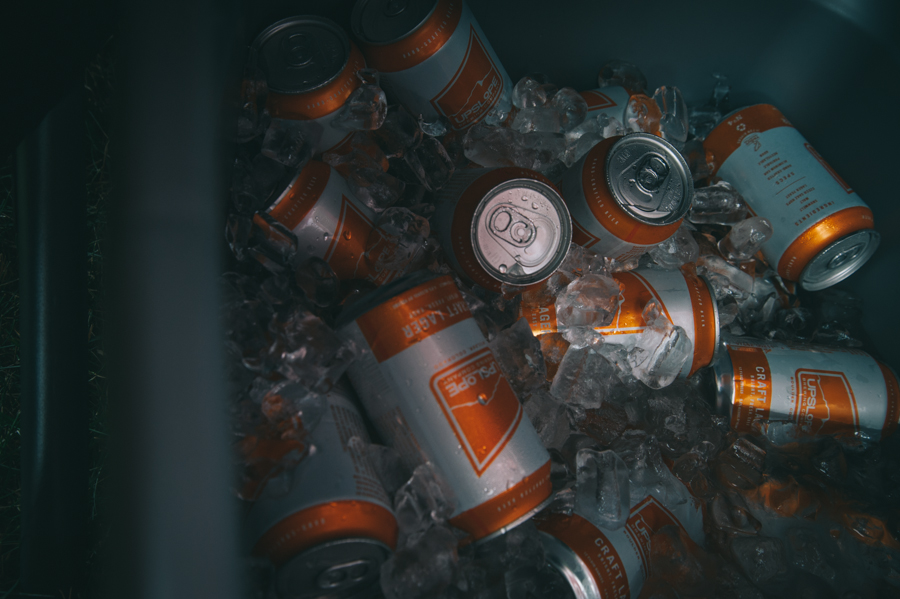 Upslope's rubbermaid full of cans.