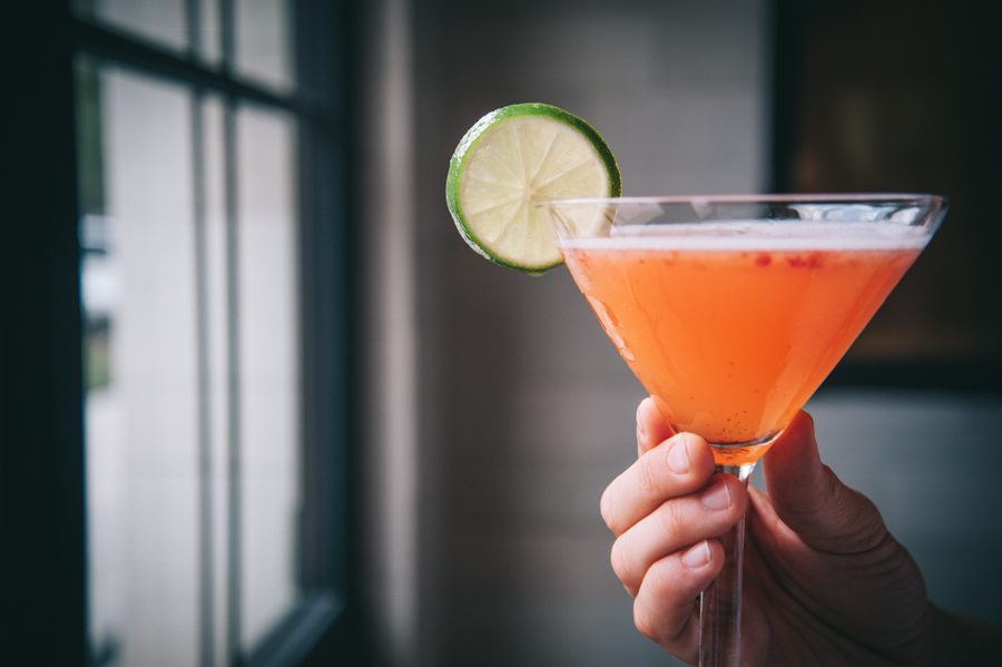 Strawberry Basil Martini made with fresh berries, muddled mint, lime juice and 101 Cane Rum.