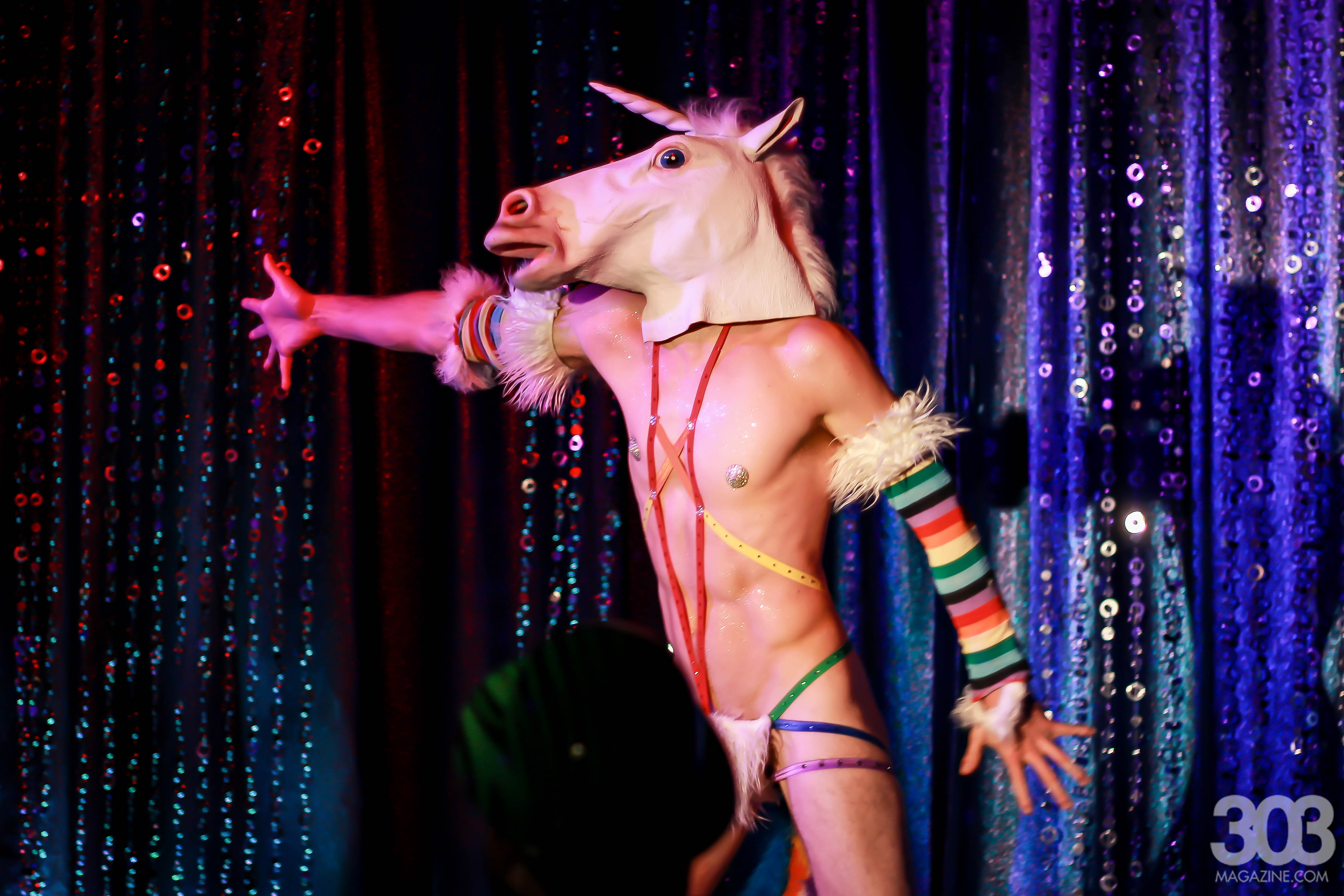 Bender Flames in his rainbow glory unicorn act. Photo by Romeo Fernandez.
