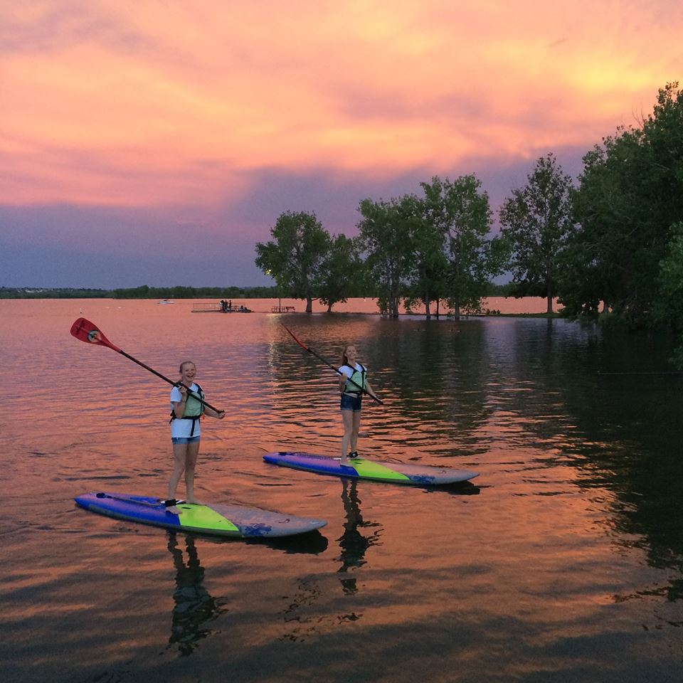 Girls SUP sunset paddle boarding at Chatfield Reservior
