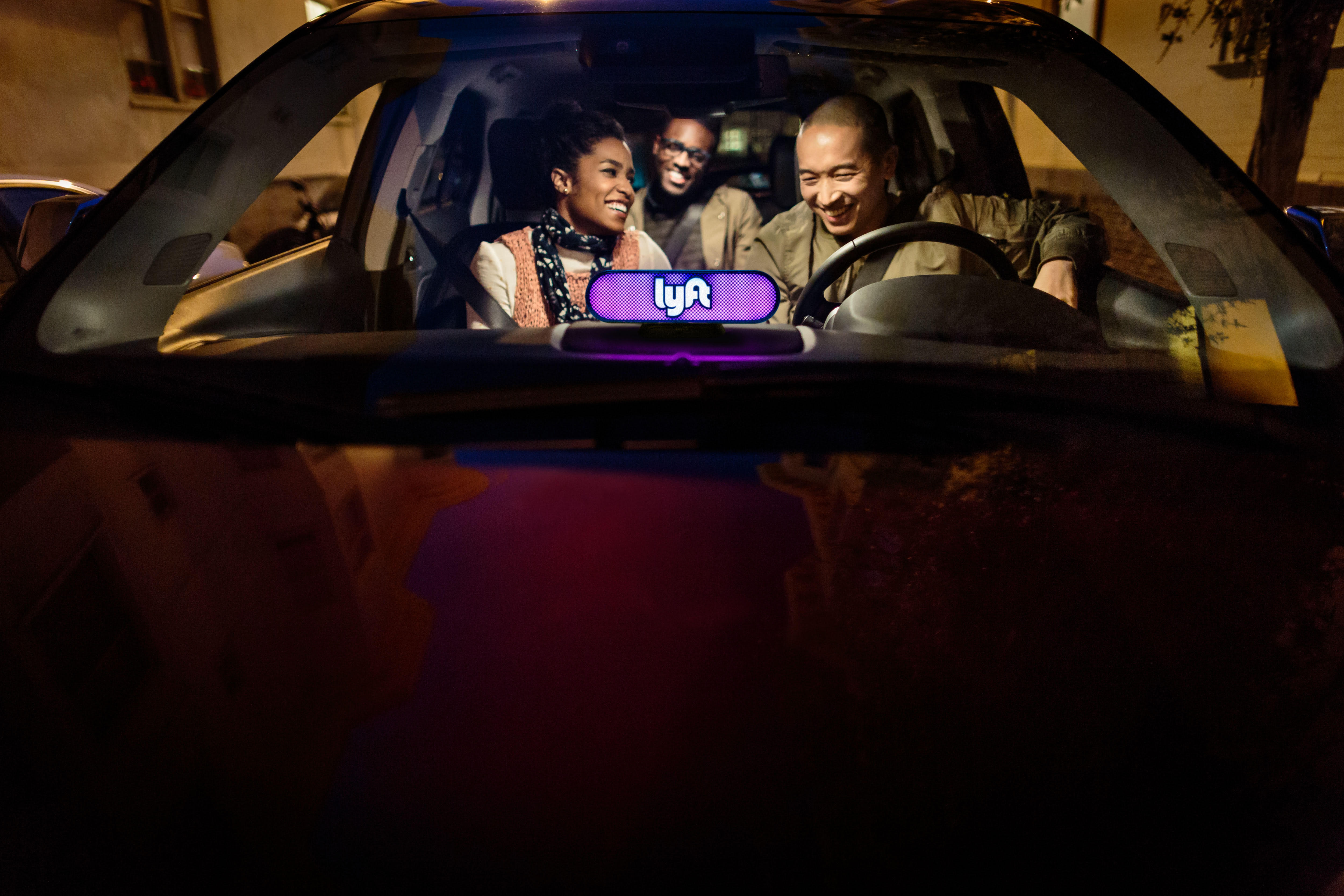 Three people riding in a lyft