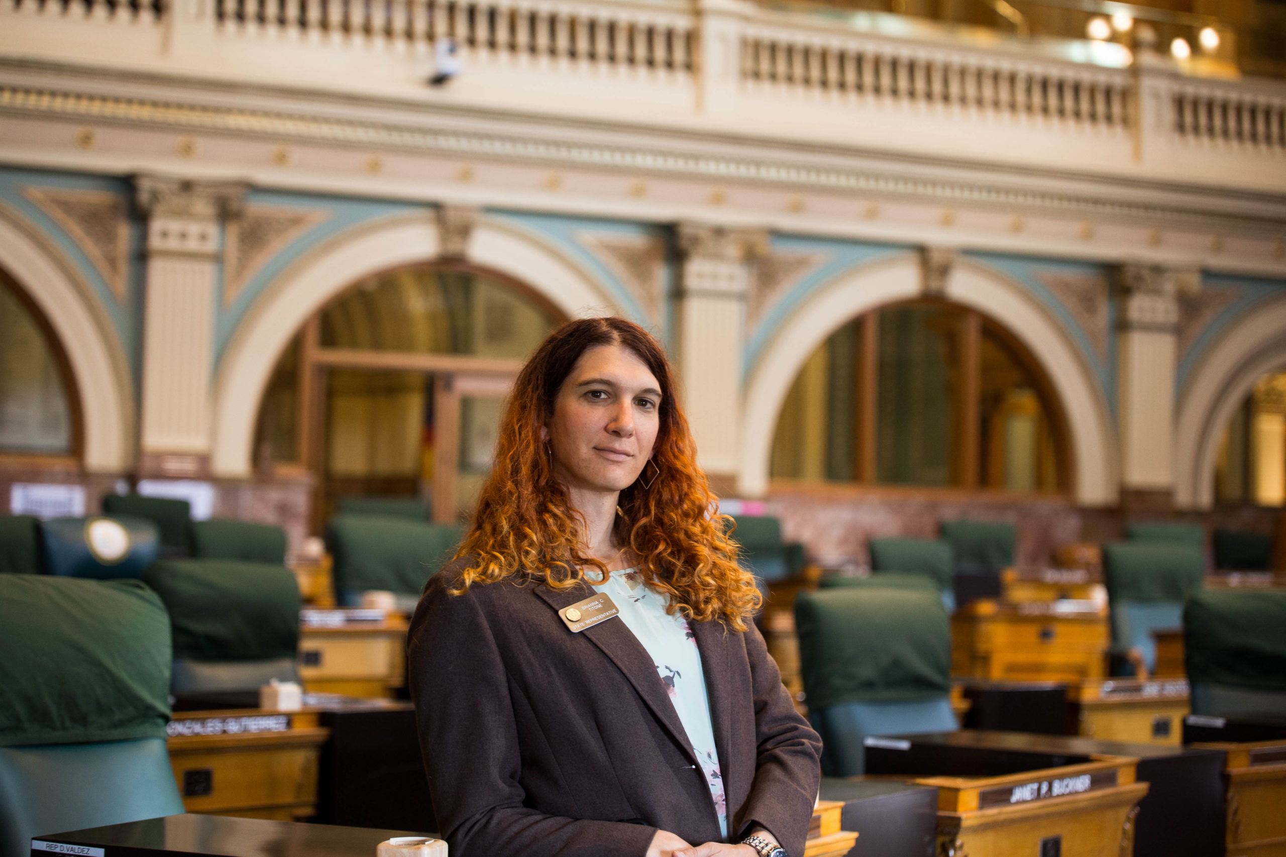 Brianna Titone sits on the House floor