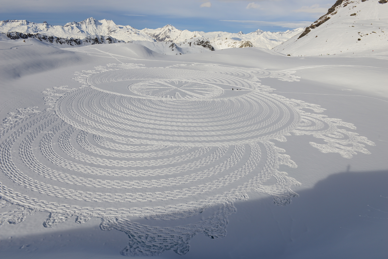 World-Renowned Artist Simon Beck Is Bringing His Massive Snow Patterns to Colorado