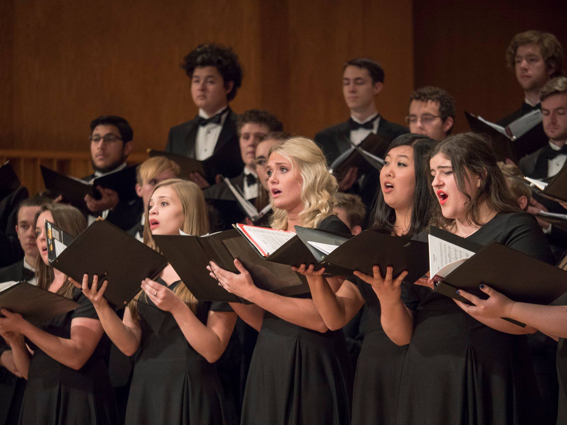 Musicians participate in a choir performance at CU Boulder