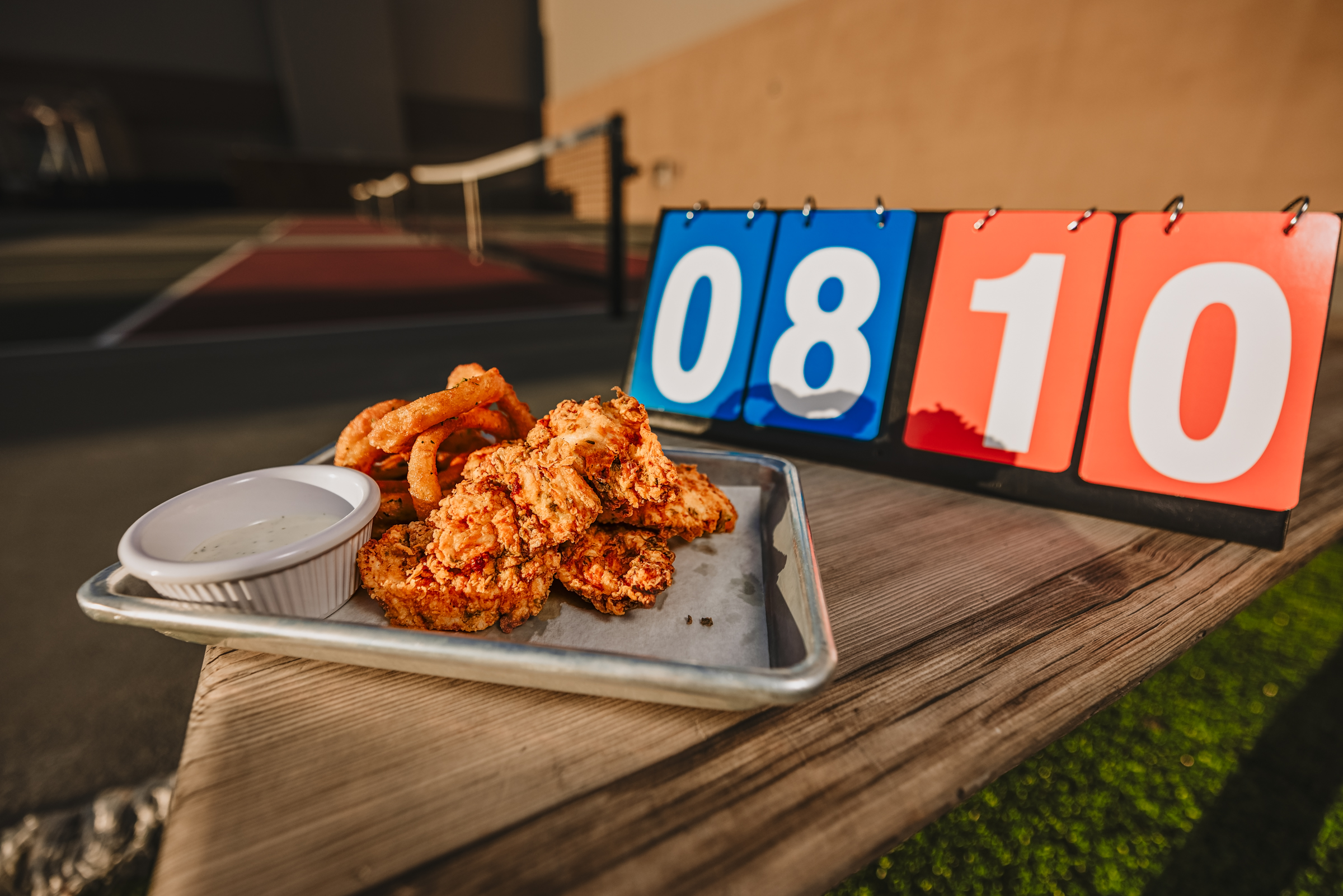 Chicken wings outdoor by the pickball court