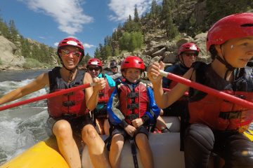 Rafters taking a family float trip down the Arkansas River