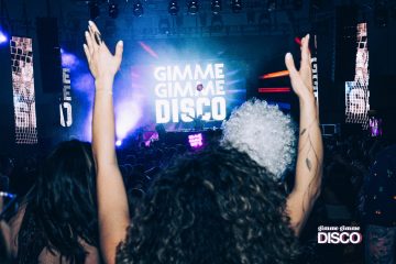 People partying at the Gimme Gimme Disco event.