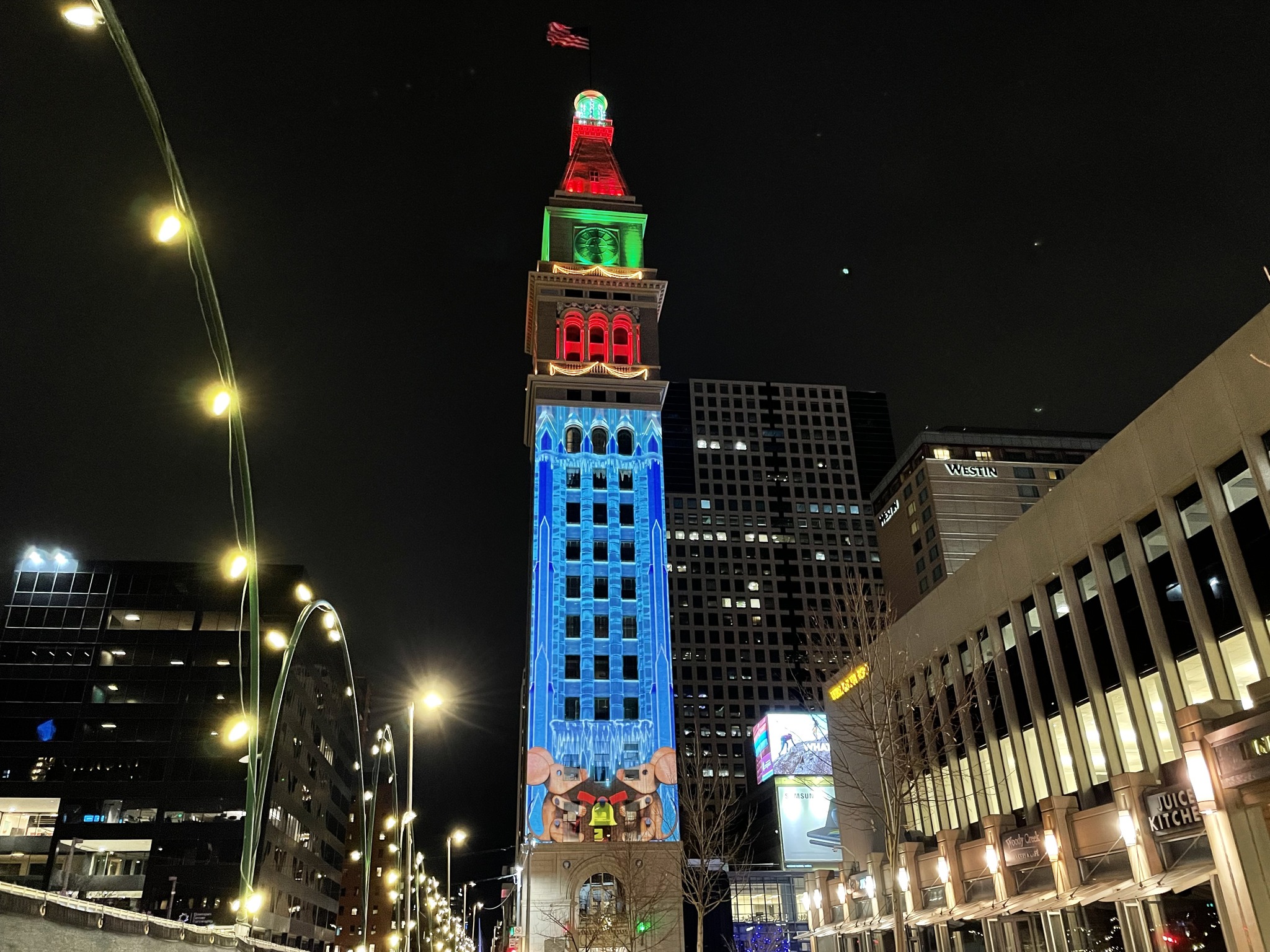 Holiday light projection on clock tower