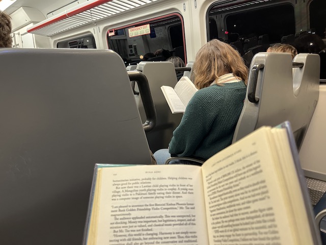 reading on the train denver, silent pages society